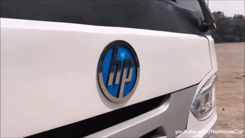 A White Car With An Hp Logo On It GIF