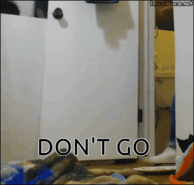 A White Door With The Words " Do N't Go " On The Bottom GIF