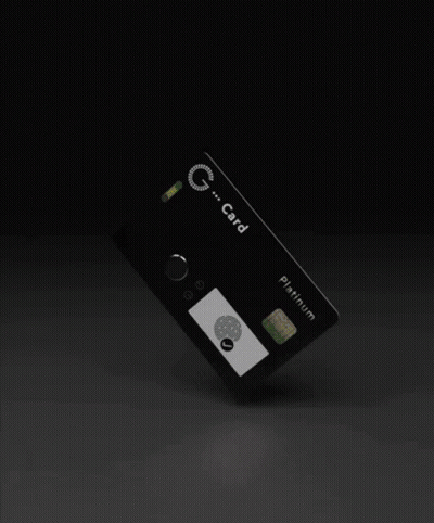 A White G Card Platinum Card Is Laying On Its Side GIF