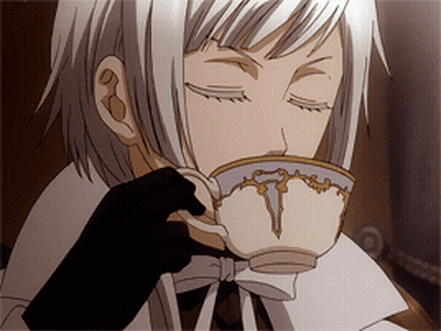 A White Haired Anime Character Is Drinking From A White Cup GIF