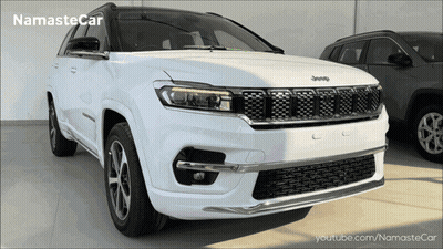 A White Jeep Is Parked In Front Of A Youtube Channel GIF