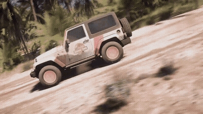 A White Jeep With A Jurassic Park Logo On The Side GIF