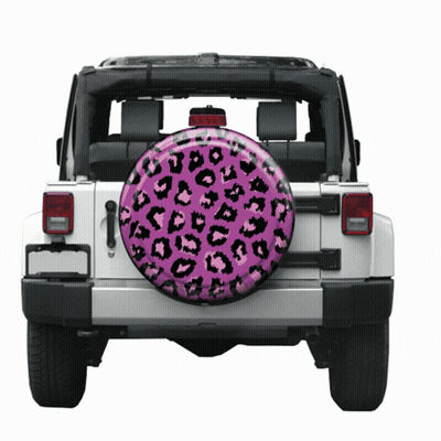 A White Jeep With A Pink And Black Leopard Print Tire Cover GIF