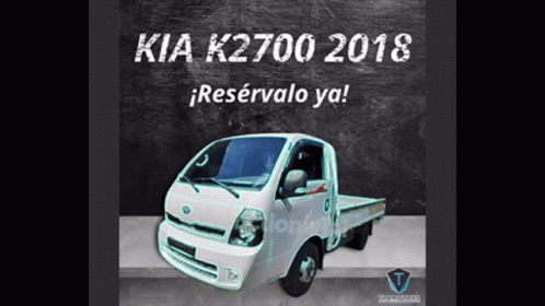 A White Kia K2700 Truck Is Sitting On A Concrete Surface GIF