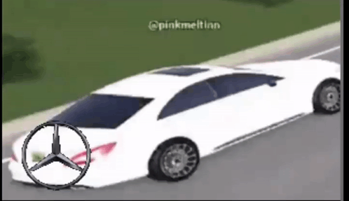 A White Mercedes Is Driving Down The Road GIF