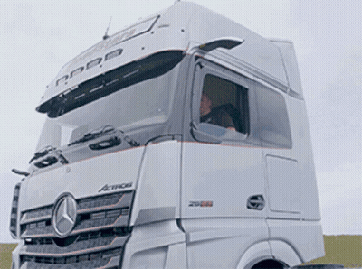 A White Mercedes Truck With The Word Actros On The Side GIF