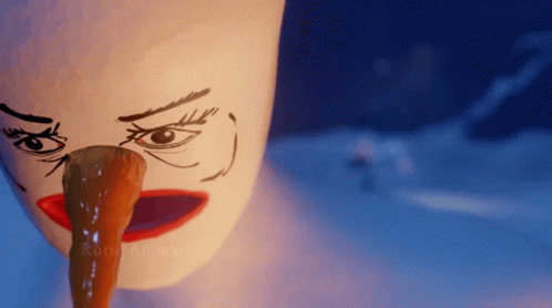 A White Mug With A Face Drawn On It And A Long Tongue GIF