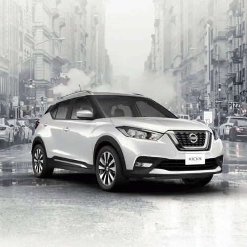 A White Nissan Kicks Is Parked In A City GIF
