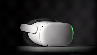 A White Oculus Virtual Reality Headset With A Green Light On It GIF