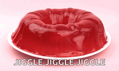 A White Plate Topped With Red Jelly And The Words " Jiggle Jiggle Jiggle " GIF