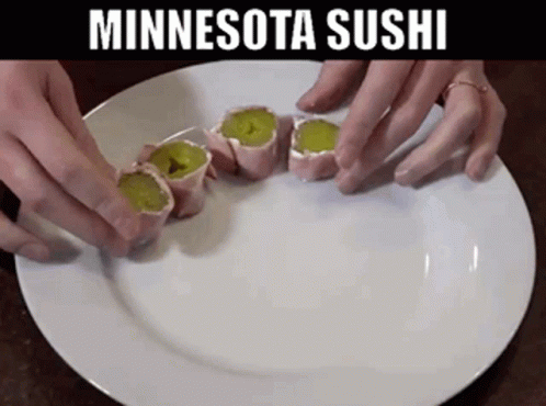 A White Plate With A Few Rolls On It And The Words Minnesota Sushi On The Bottom GIF