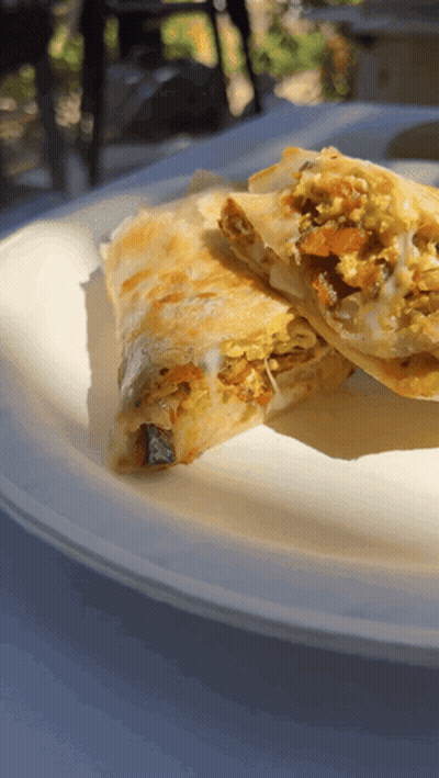 A White Plate With A Sandwich On It GIF
