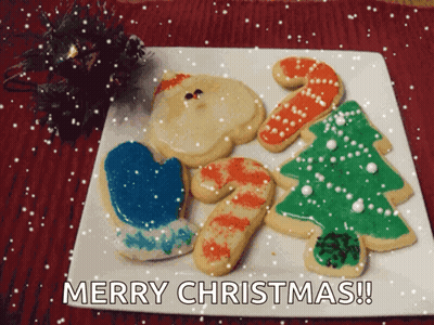A White Plate With Christmas Cookies On It And The Words Merry Christmas GIF