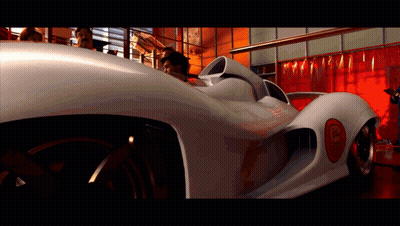 A White Race Car With The Number 5 On The Front GIF