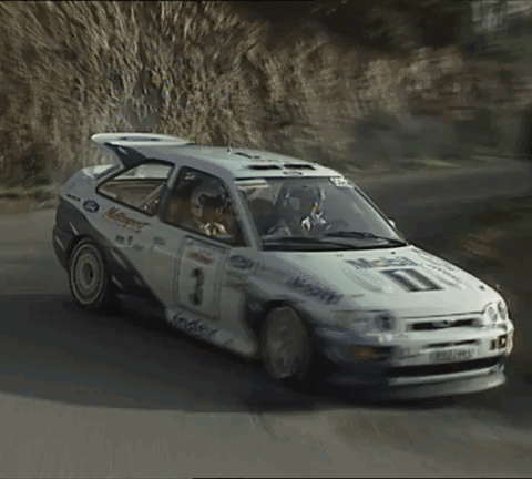 A White Rally Car With The Number 3 On It GIF