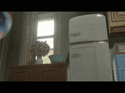 A White Refrigerator Sits In A Kitchen Next To A Vase Of Flowers GIF