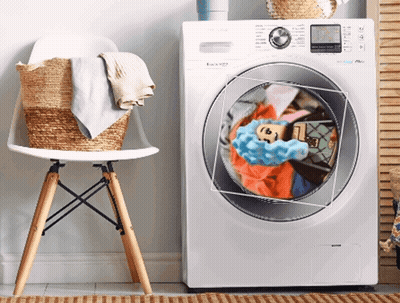 A White Samsung Washing Machine With Clothes Inside GIF