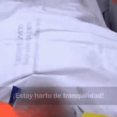 A White Shirt With The Words Estoy Harto De Tranquilidad GIF