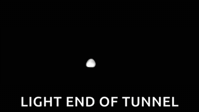 A White Silhouette Of A Tunnel With The Words `` Light End Of Tunnel '' Written Below It . GIF
