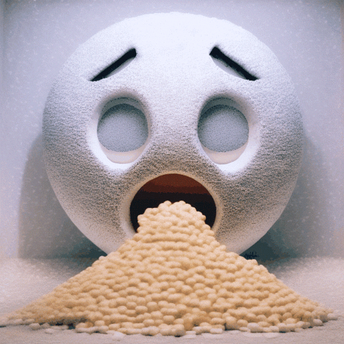 A White Smiley Face With Its Mouth Open And A Pile Of Beans Coming Out Of It GIF