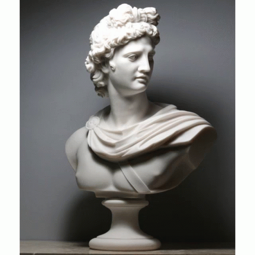 A White Statue Of A Man With A Shawl Around His Neck GIF