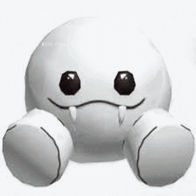 A White Stuffed Animal With Black Eyes And Teeth Is Smiling . GIF