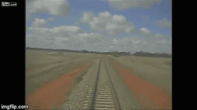 A White Suv Is Driving Down A Dirt Road With Imgflip.com In The Corner GIF