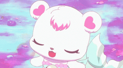 A White Teddy Bear With Pink Ears And A Pearl Necklace GIF
