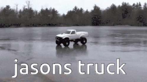 A White Truck Is Driving On A Frozen Lake With The Words Jasons Truck Written Below It GIF