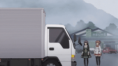 A White Truck Is Parked In Front Of A Building With A Sign That Says " Store " On It GIF