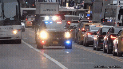 A White Truck With The Number 07Z45c0076 On The Back GIF