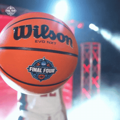 A Wilson Evo Nxt Basketball Is Being Held Up By A Person GIF
