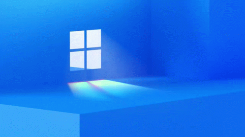 A Window In A Blue Room With A Light Shining Through It GIF
