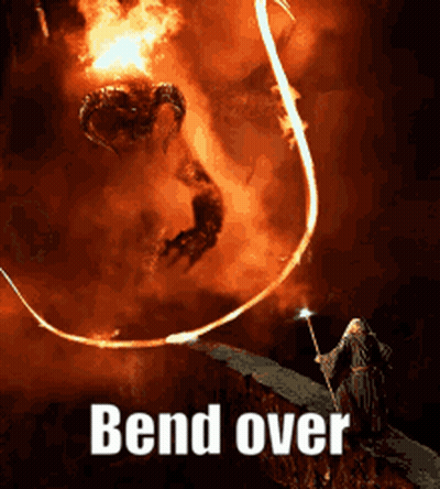 A Wizard Is Holding A Wand In Front Of A Demon And The Words Bend Over GIF