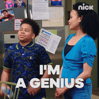 A Woman And A Boy Are Standing In Front Of A Refrigerator That Says I 'M A Genius On It GIF