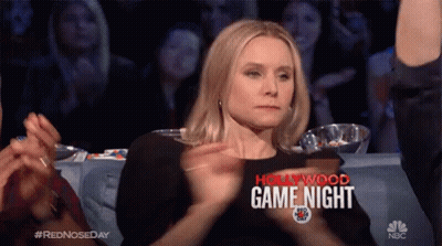 A Woman Applauds During A Hollywood Game Night Show GIF