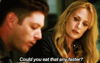 A Woman Asks A Man If He Could Eat Something Faster GIF