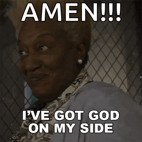 A Woman Behind A Chain Link Fence Says Amen I Ve Got God On My Side GIF