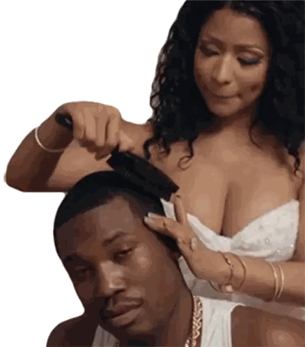 A Woman Brushes A Man 'S Hair While Wearing A White Dress Sticker