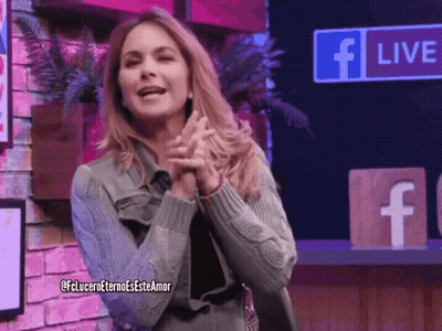 A Woman Clapping Her Hands In Front Of A Facebook Live Sign GIF