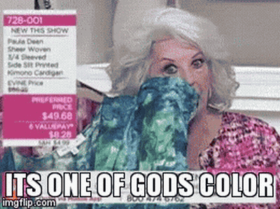 A Woman Covering Her Face With A Sweater That Says It 'S One Of Gods Color On It GIF