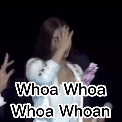 A Woman Covering Her Face With Her Hand And The Words Whoa Whoa Whoa Whoan Written Below Her GIF