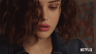 A Woman Covering Her Face With Her Hand With A Netflix Logo In The Corner GIF