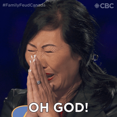 A Woman Covering Her Face With Her Hands And The Words Oh God On The Bottom GIF
