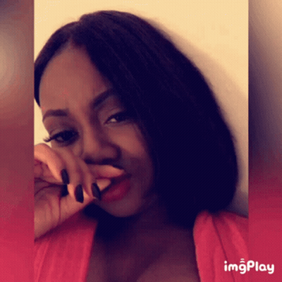 A Woman Covering Her Nose With Her Hand And A Red Background With Imgplay At The Bottom GIF