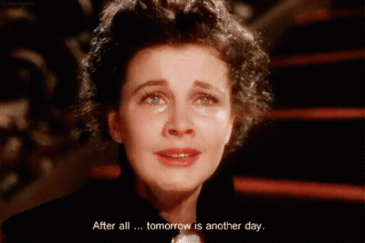 A Woman Crying With The Words After All Tomorrow Is Another Day Below Her GIF