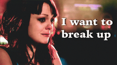 A Woman Crying With The Words " I Want To Break Up " Behind Her GIF