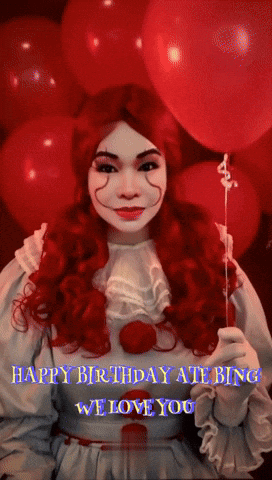A Woman Dressed As A Clown Holding A Red Balloon With The Words Happy Birthday Ate Bingo We Love You GIF