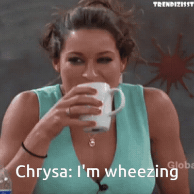 A Woman Drinking From A Cup With The Words Chrysa I 'M Wheezing Written Below Her GIF