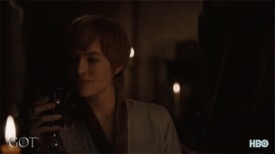 A Woman Drinking From A Glass With The Word Got On The Bottom Right GIF